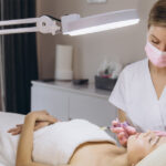 First-time patient learning what to expect from dermal fillers during consultation