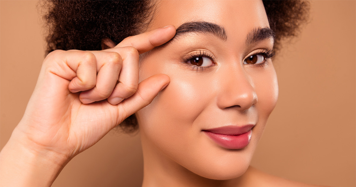 Woman with soft and natural-looking botox results showing balanced facial expression