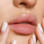 Woman with natural-looking lip fillers and soft cosmetic enhancement results
